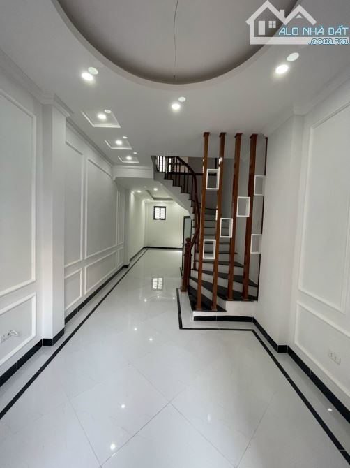 Nhà mới Cạnh Nhổn 40x5 tầng 7 ngủ, ô tô, giá 4.95 tỷ - 2
