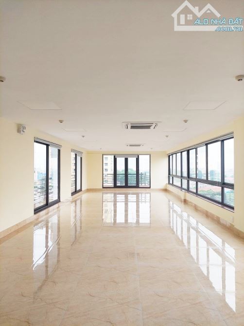 Tòa vp Khuất Duy Tiến , 142 m2 – 9 tầng thông sàn , 1 mặt phố + 1 mặt ngõ ô tô , 88 tỷ