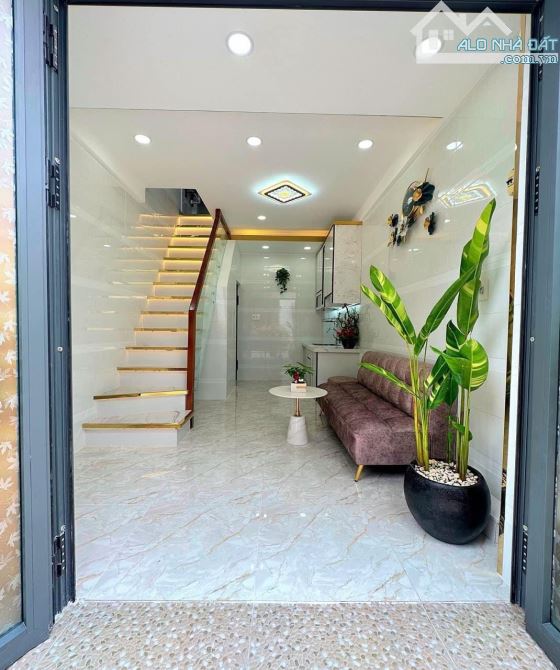 Nhà nhỏ xinh Đặng Nguyên Cẩn 15m2, 2 tầng BTCT vài bước ra mặt tiền