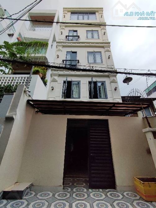 Bán CHDV 6Tầng (5.1 x 24) CÓ THANG MÁY thu nhập 1.5tỷ/năm, sát mặt tiền Nguyễn Trọng Tuyển