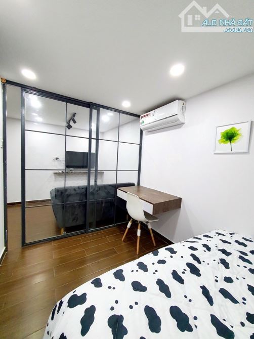 Cho thuê căn hộ 1 phòng ngủ tách bếp có cửa sổ trên đường Nguyễn Trãi, Q1 - 6