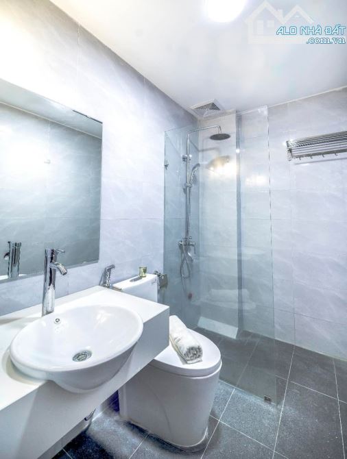 BÁN TÒA APARTMENT Ở ĐƯỜNG QUẦN NGỰA - BA ĐÌNH, 75M2*4.5M*7T T.MÁY, PHÂN LÔ, GARA - VỈA HÈ - 5