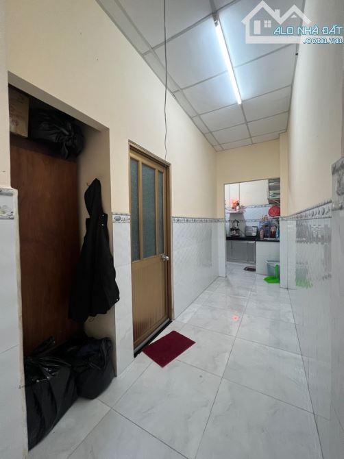 Bán chia tài sản cho con cháu căn nhà trệt lầu và dãy phòng trọ, 150m2, chiều ngang 12 mét - 2