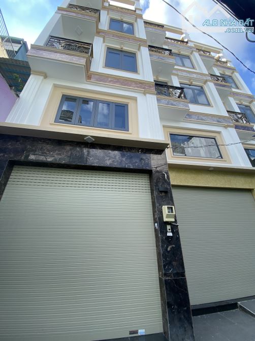 Nhà MỚI XÂY 100% 4x17m, 5 tầng, 4PN, 5WC Hẻm xe hơi 5m ngủ trong nhà. Phan Xích Long.