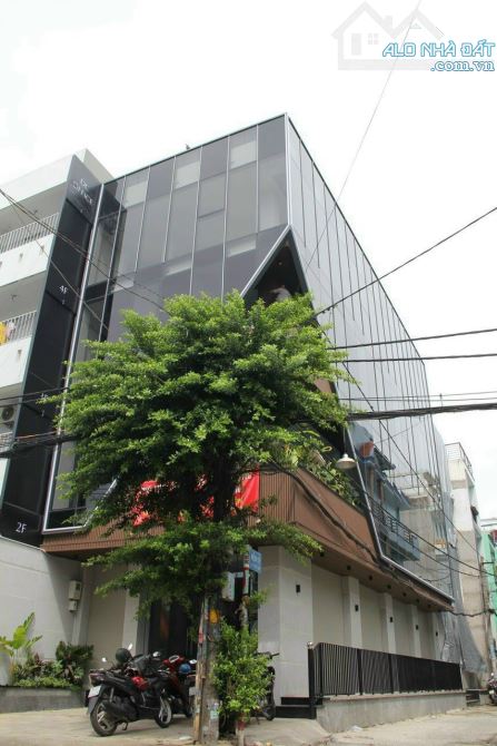 28 Tỷ Bán Nhà Tòa nhà Góc 2MT Nguyễn Hữu Tiến Q.TP, DT: 7x26, 5tầng+ thang máy, HĐT: 90tr