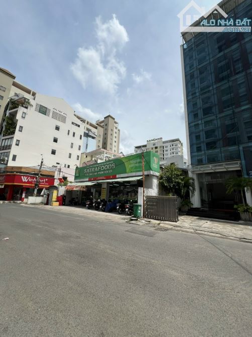 Tòa Building góc 3 MT Lê Quang Định Q.Bình Thạnh 67x20m - Hầm 9 tầng HĐT 300tr giá 55 tỷ - 6
