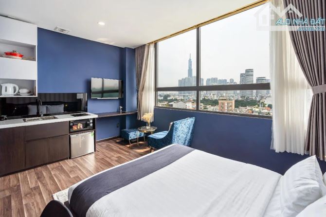 Tòa Building góc 3 MT Lê Quang Định Q.Bình Thạnh 67x20m - Hầm 9 tầng HĐT 300tr giá 55 tỷ - 9