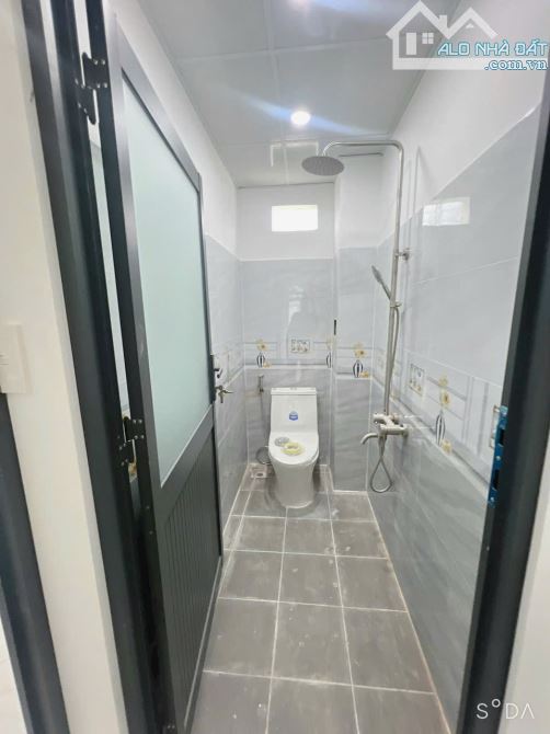 Bán gấp nhà mới xây 1 trệt 1 lầu thổ cư sổ riêng cầm tay sẵn, ngay trường THCS Thạnh Phú - 9