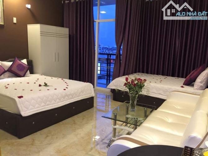 Bán hotel 30 phòng Nguyễn Thị Thập - 140m2 , hẻm oto kế mặt tiền ,doanh thu hơn 100tr/th