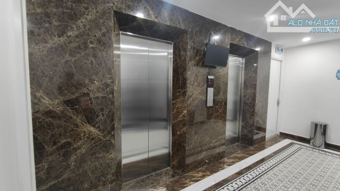 Tòa nhà phố Trần Thái Tông, lô góc 2 mặt đường, 200m2 9 tầng có hầm, giá thỏa thuận - 1