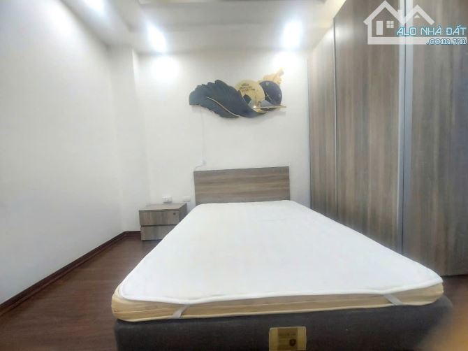 Bán nhà mặt phố Âu Cơ bên số lẻ, DT 128m, 7 tầng mới, thang máy, MT 5.7m, giá 53.5 tỷ. - 2