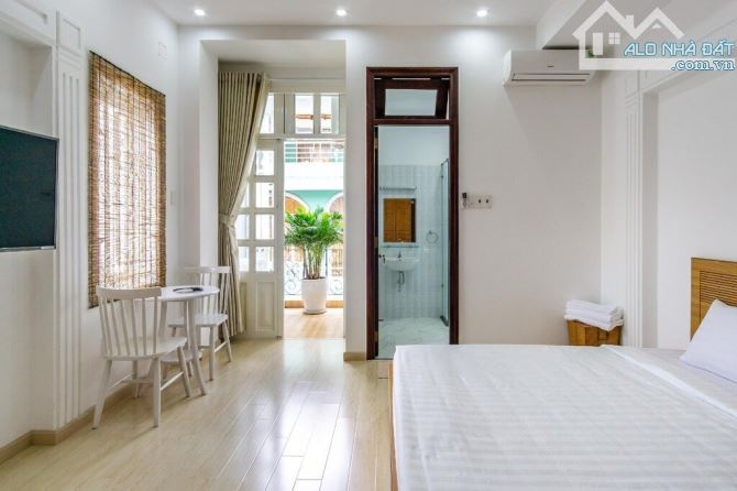 Bán nhà 5 tầng thu nhập 50tr/tháng,hẻm xe hơi Hoàng Hoa Thám, 9 phòng studio, giá 9.350 tỷ - 1