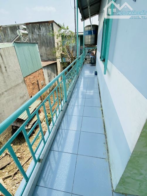 Nhà 1 trệt lầu + 3 phòng trọ gần vòng xoay An Phú p. Tân Bình Tp Dĩ An - 4