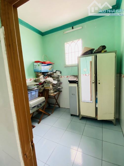 Nhà 1 trệt lầu + 3 phòng trọ gần vòng xoay An Phú p. Tân Bình Tp Dĩ An - 5