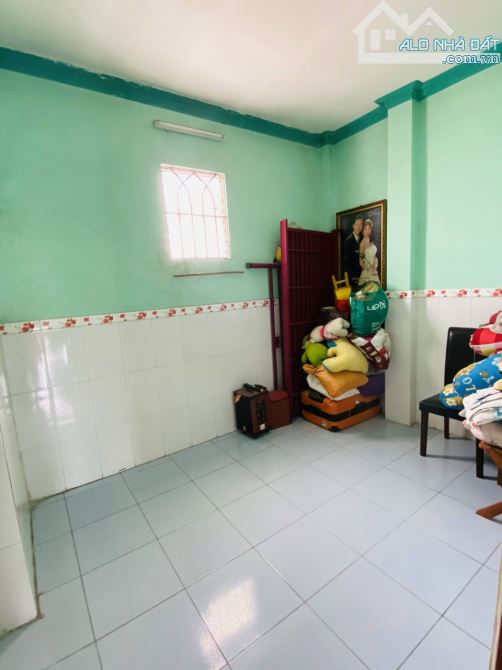 Nhà 1 trệt lầu + 3 phòng trọ gần vòng xoay An Phú p. Tân Bình Tp Dĩ An - 8