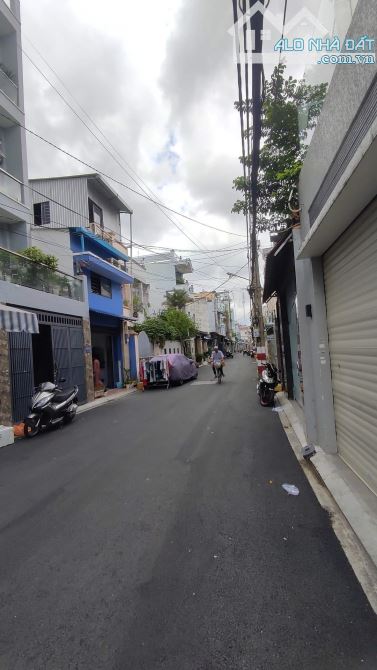 Bán Nhà Trọ cao cấp hẻm 7m trước sau Thoại Ngọc Hầu Tân Phú 4x20m đúc hầm lửng 4 lầu ST - 1