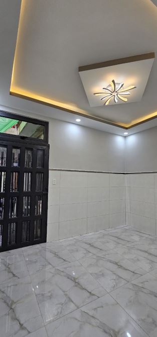 Nhà hẻm Lạc Long Quân - 4,15x11,5m - 5,2 tỷ TL - 2 mặt tiền hẻm trước sau P3 Q11 - 6