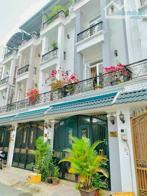 Bán nhà Hẻm xe hơi 7m Tân Hương (4 x 12,5m), nhà 1 trệt 3 lầu, gồm 4 phòng và 4 tolet