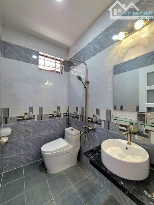 Cần bán nhà ngay Nguyễn Văn Đậu, Bình Thạnh. Giá: 2.2 tỷ/60m2, sổ hồng riêng, hẻm 5m - 3