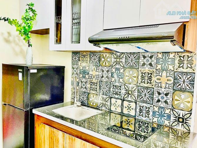 Bán tòa nhà CCMN 60m2 Hoàng Cầu 6 tầng thang máy - Căn góc thoáng sáng - 4