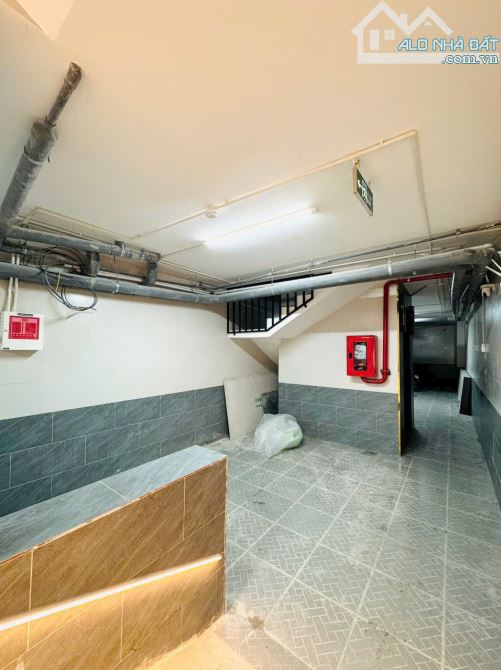 CHDV Hẻm xe tải, 100m2, Hầm + 5 tầng, 18 phòng full NT cao cấp, thang máy, Full PCCC - 1