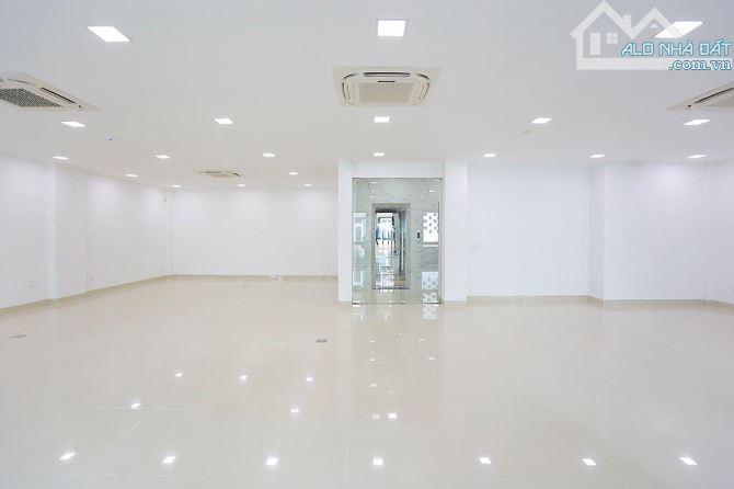 Bán tòa Văn Phòng Phố Trung Văn, Ô tô tránh, lô góc DT 150m2 x 9 tầng MT 8.5m, Giá 35.9 tỷ - 1
