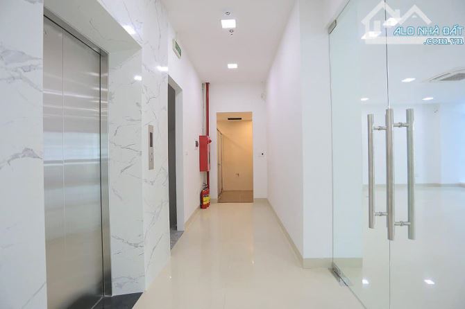 Bán tòa Văn Phòng Phố Trung Văn, Ô tô tránh, lô góc DT 150m2 x 9 tầng MT 8.5m, Giá 35.9 tỷ - 4