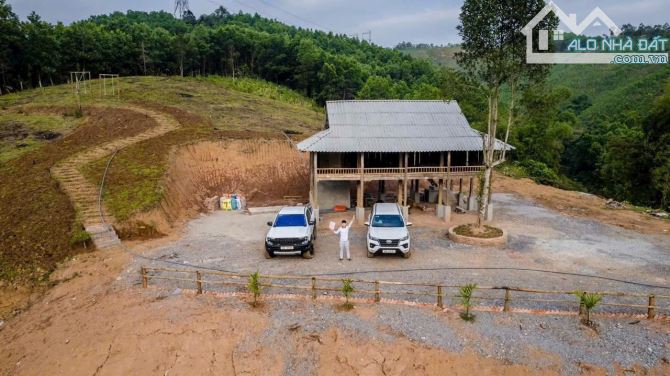 Chỉ 2,3 tỷ,9400m,bám hồ tận 100m vút tầm mắt,ô tô vào,sẵn nhà sàn,cao thoáng view trọn hồ - 2