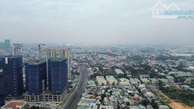 Bán Nhà Mặt Tiền  Đường Thống Nhất Dĩ An 5.58×22.5 Đối Diện Bcons city - 1