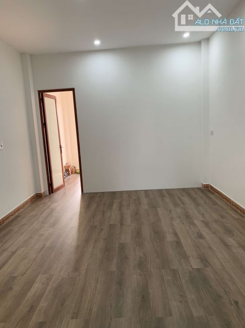 BÁN NHÀ 2 TẦNG DÂN XÂY LÔ GÓC MẶT ĐƯỜNG TRẦN NHẬT DUẬT - 3