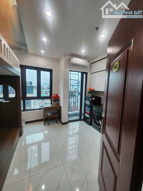 Cho Thuê CCMN 144 Quan Nhân 30m2 Studio Giường Tầng Ban Công Thang Máy Ô Tô Giặt Riêng