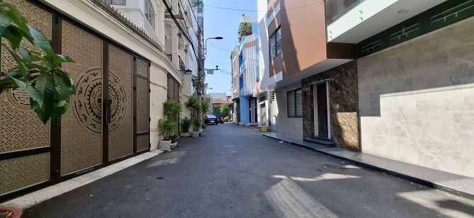 Bán nhà căn góc 2 mặt tiền HXH Cách Mạng Tháng Tám, DT 5.4 x 14m, 4 tầng, giá 9.8 tỷ - 1