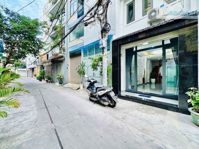 NHÀ MỚI 5 TẦNG KHU VIP PHAN XÍCH LONG P3 PHÚ NHUẬN - 4