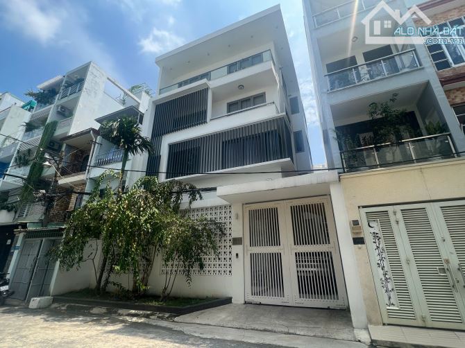 Bán Nhà Đường Nguyễn Minh Hoàng - K300. DT: 8x17m, hầm 3 tầng giá bán 27.5 tỷ
