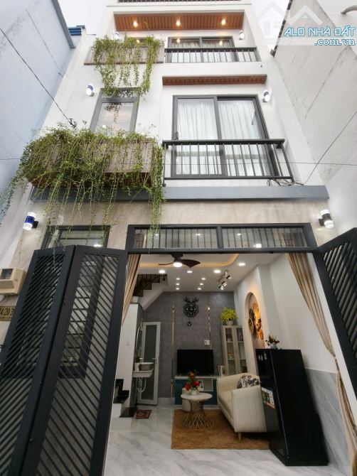 Nhà nhỏ hẻm thông xe hơi đậu cửa P9 Gò Vấp