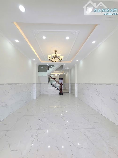nhà 1 trệt 2 lầu 80m2 6ty8 Tl MT đường Nguyễn Thị Khắp p.Tân Đông Hiệp, Tp.Dĩ An - 1