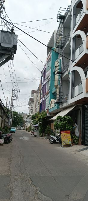 SIÊU PHẨM 4 TẦNG HẺM 10M . Nhà 4 tầng hẻm 10m trên đoạn đường Dương Quảng Hàm 32m vừ - 2