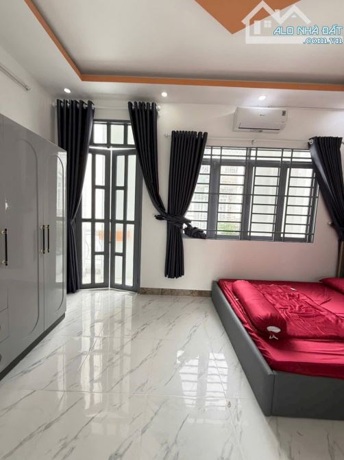 Nhà đẹp, đường rộng, (5x11) trệt, 2 lầu, 4PN, 3WC, Sổ riêng, Thạnh Lộc 16, Q12 - 4