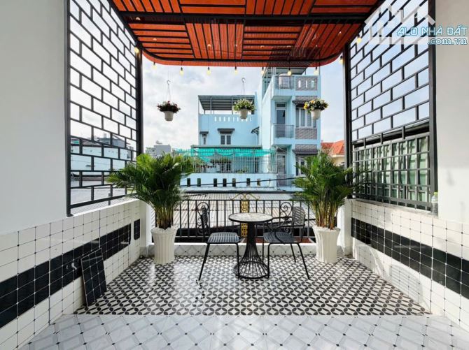 Bán nhà hẻm xe hơi 4,5m thông đường Bùi Quang Là, P.12, 3,7 x 20, 2 tầng giá 6.4 tỷ tl - 6