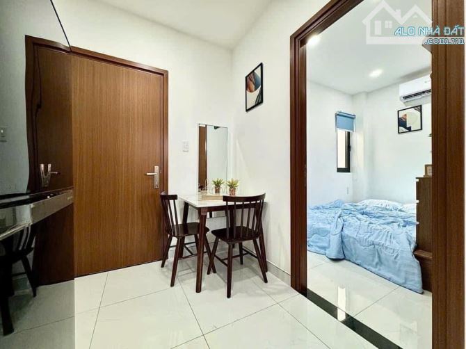 Bán CHDV giáp Phan Đăng Lưu,Phú Nhuận,  ngang 6m dài 22m dtcn: 128m2. Dòng tiền 85tr/ thán - 8