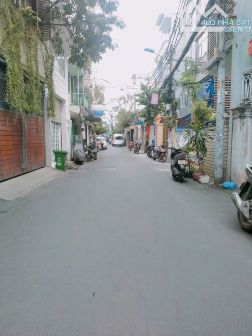 BÁN NHÀ ĐOÀN THỊ ĐIỂM , PHÚ NHUẬN, MẶT TIỀN HẺM 10M,KINH DOANH ĐỈNH ,4 TẦNG CHỈ 10.X TỶ