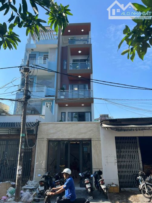 Bán nhà MTKD Khuông Việt Tân Phú 4x20.5m đúc 4 lầu giá 15 tỷ TL (trang bị thang máy)