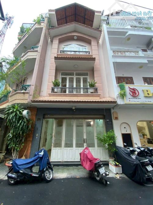 Nhà bán MT Hoa Huệ dt 5x8 trệt 5L giá có nhỉnh 16 tỷ