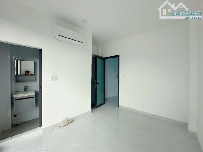 Nhà mặt tiền đường Tú Mỡ Phường 7 ngang 4m5 có 3 tầng 3 phòng giá 4 tỷ 700 SHR Quận Gò Vấp - 1