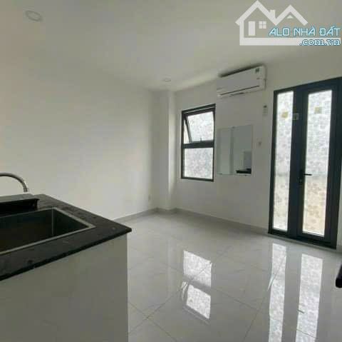 CHDV 5 TẦNG GẦN PHẠM VĂN ĐỒNG - HXH NÉ NHAU THÔNG 2 ĐẦU - NGANG 14 MÉT - DÒNG TIỀN 70TR/TH - 4