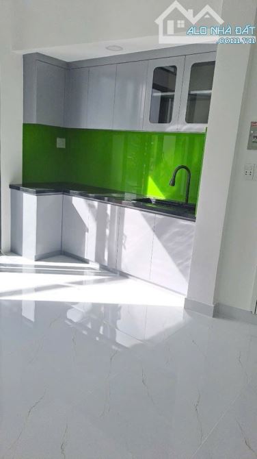 Nhà mặt tiền đường Tú Mỡ Phường 7 ngang 4m5 có 3 tầng 3 phòng giá 4 tỷ 700 SHR Quận Gò Vấp - 4