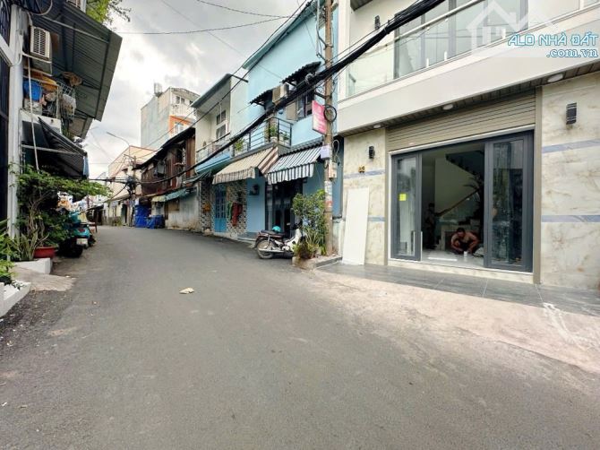 Nhà mặt tiền đường Tú Mỡ Phường 7 ngang 4m5 có 3 tầng 3 phòng giá 4 tỷ 700 SHR Quận Gò Vấp - 6