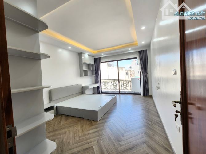 BÁN NHÀ MẶT ĐƯỜNG HOÀNG MAI. 7 TẦNG. THANG MÁY. GARA Ô TÔ. KINH DOANH.