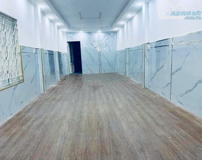 Nhà Vị trí KD Hẻm thông 5m xe hơi Nguyễn Hữu Cảnh