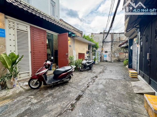 nhà hẻm xe hơi, DT :4,6x13m=5,78tỷ. trệt lầu, sân thượng.Quang trung P.10 GV - 1
